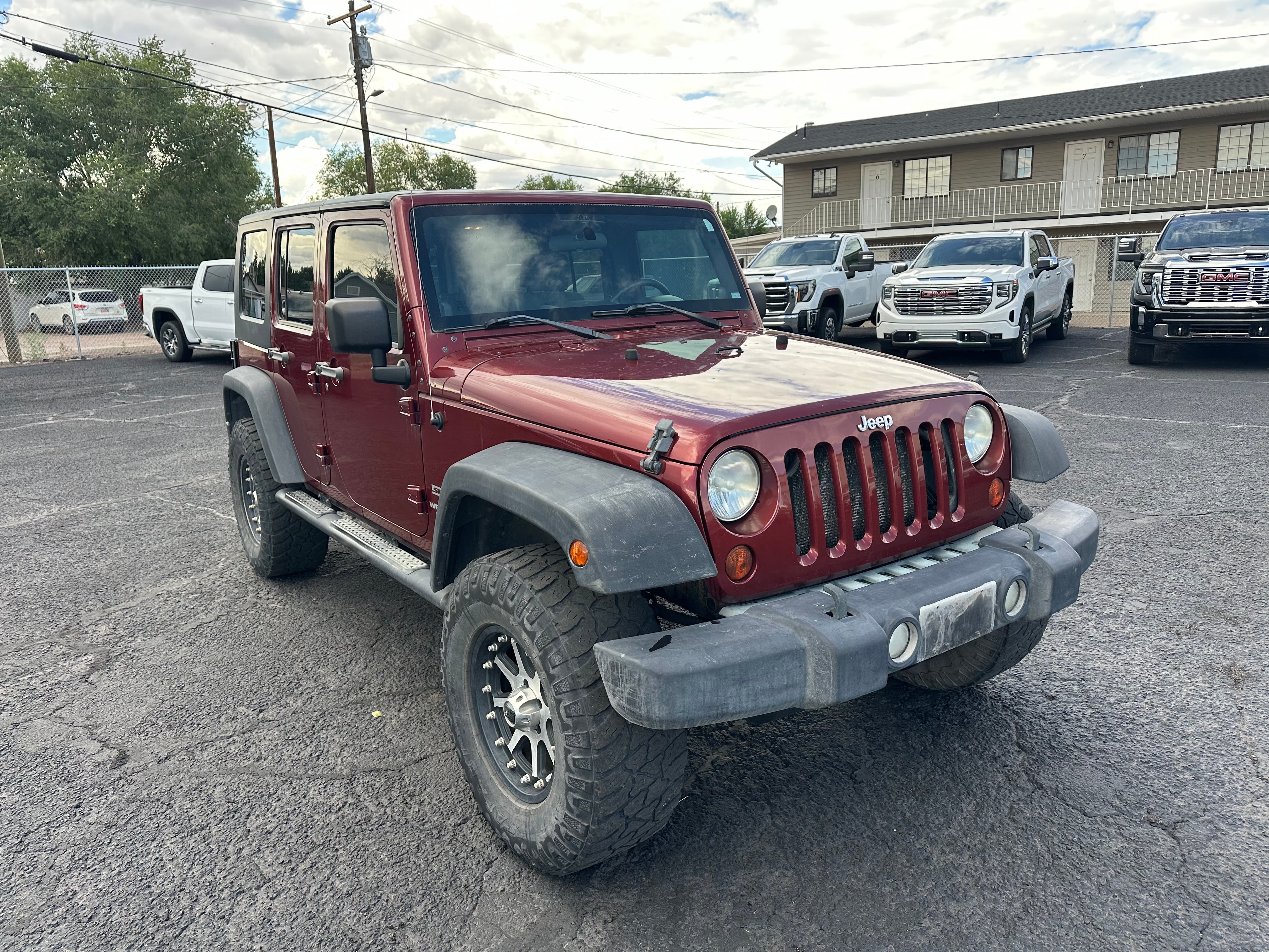 Used 2010 Jeep Wrangler Unlimited Sport with VIN 1J4BA3H15AL104725 for sale in Roosevelt, UT